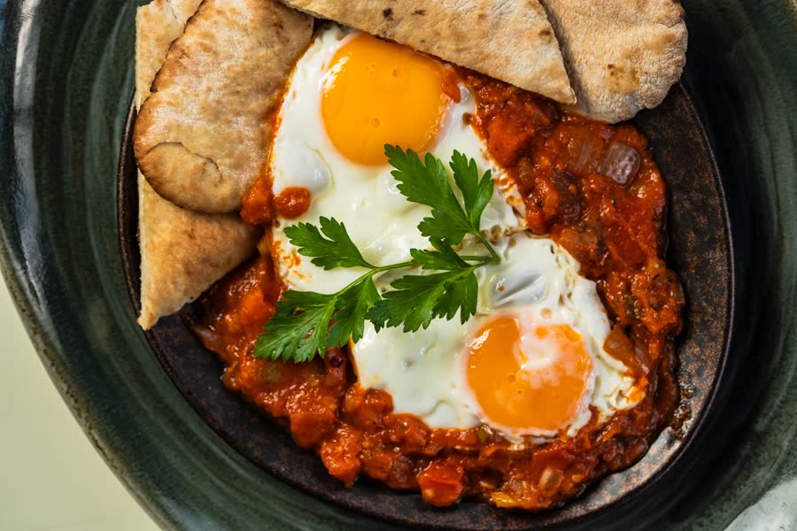 Shakshuka, eggs poached in tomato sauce